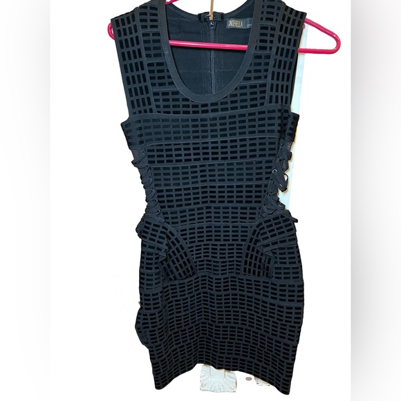 Black minidress with side mesh panels. Fitted/ stretch size small - Picture 1 of 5